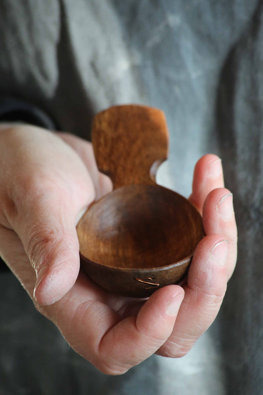 Hand carved walnut wooden coffee scoop with copper wire stitching